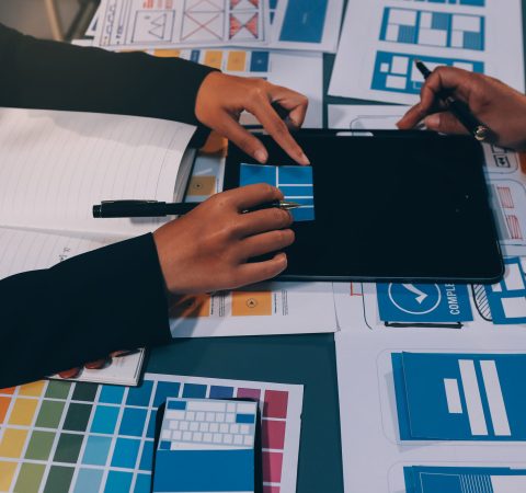 The designer team is designing the uxui system to make the uxui system work well on new phones and support system updates. Website development concept UI UX front end designer